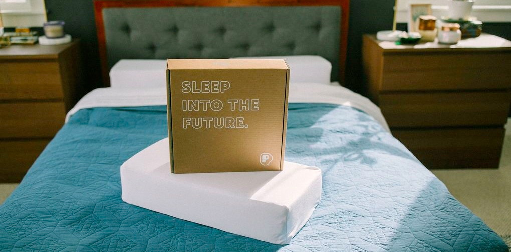 Pillow Cube product op het bed